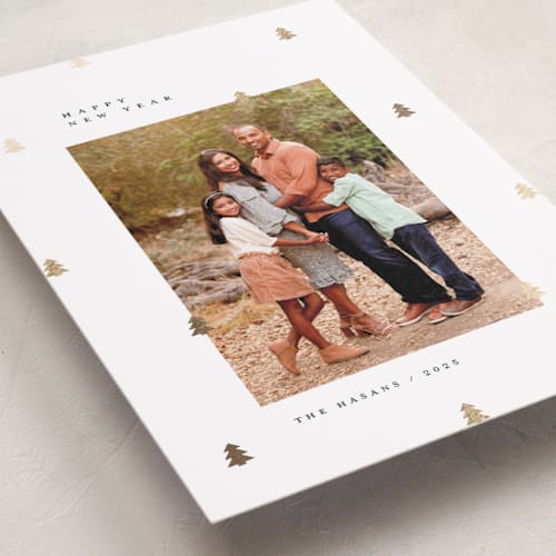 This is a cotton foil pressed holiday cards with foil pressed by Michelle Taylor called scattered trees printing on recycled smooth signature in standard