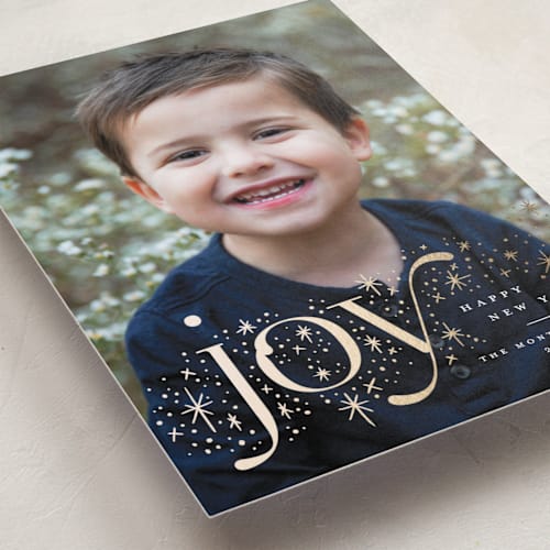 This is a sparklers foil pressed holiday cards with foil pressed by Wildfield Paper Co called sparkling joy! printing on recycled smooth signature in standard