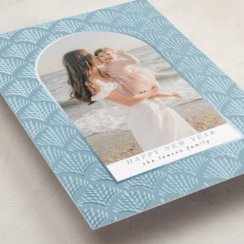 This is a aquamarine foil pressed holiday cards with foil pressed by Tamara Hilje called palmdeco printing on recycled smooth signature in standard