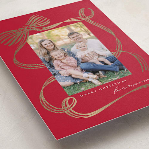 This is a cranberry foil pressed holiday cards with foil pressed by Carrie ONeal called neddy printing on recycled smooth signature in standard