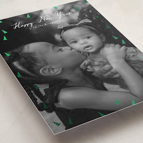 This is a snow foil pressed holiday cards with foil pressed by Heather Schertzer called tree lot printing on recycled smooth signature in standard