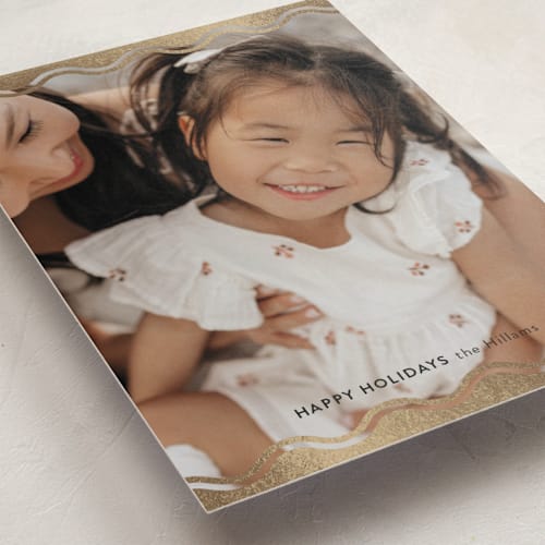 This is a night foil pressed holiday cards with foil pressed by Danie Romrell called ric rac top and bottom printing on recycled smooth signature in standard