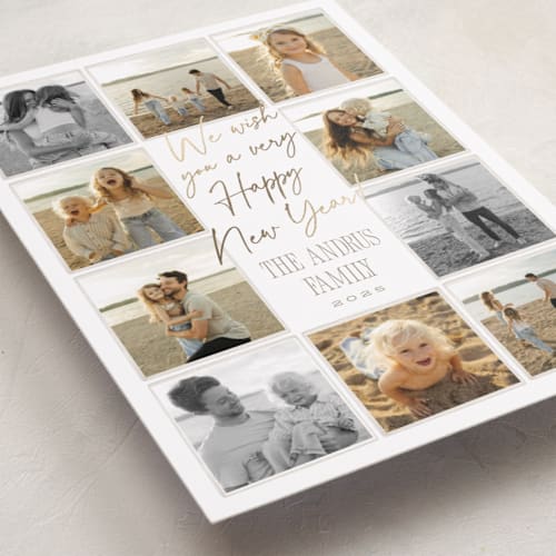 This is a snow foil pressed holiday cards with foil pressed by Robert and Stella called christmas candids printing on recycled smooth signature in standard