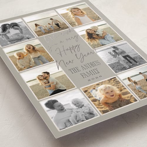 This is a tinsel foil pressed holiday cards with foil pressed by Robert and Stella called christmas candids printing on recycled smooth signature in standard