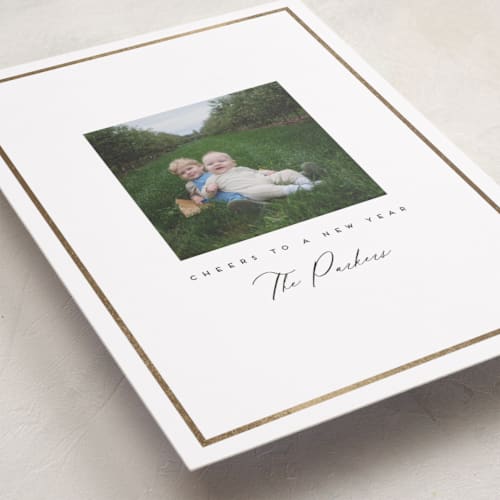 This is a snow foil pressed holiday cards with foil pressed by Angela Garrick called petit printing on recycled smooth signature in standard