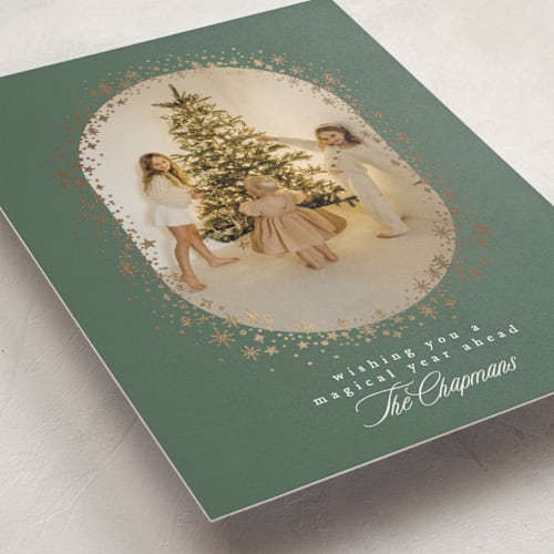 This is a forest foil pressed holiday cards with foil pressed by Karidy Walker called magical holiday season printing on recycled smooth signature in standard