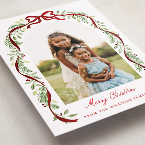 This is a cardinal foil pressed holiday cards with foil pressed by Sarah Knight called ribbon arch printing on recycled smooth signature in standard