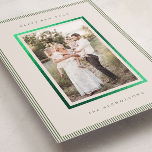 This is a cedar foil pressed holiday cards with foil pressed by Kelly Schmidt called striped border printing on recycled smooth signature in standard