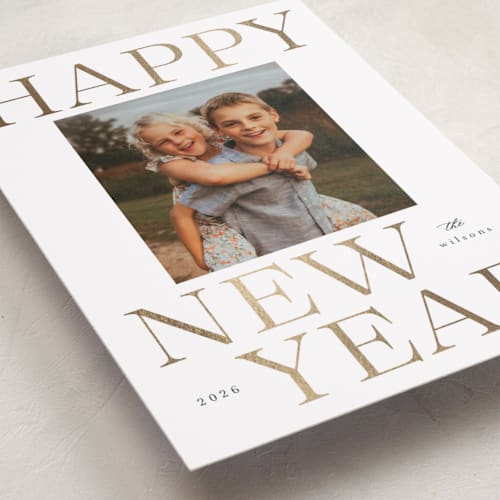 This is a snow foil pressed holiday cards with foil pressed by Kasia Labocki called lettered printing on recycled smooth signature in standard