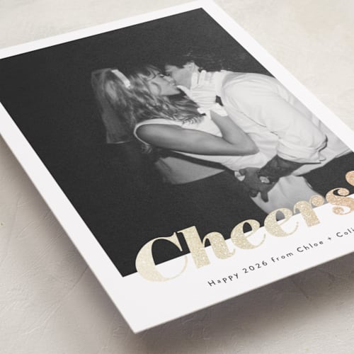 This is a ink foil pressed holiday cards with foil pressed by Emily Sabol Goss called glittering cheers printing on recycled smooth signature in standard