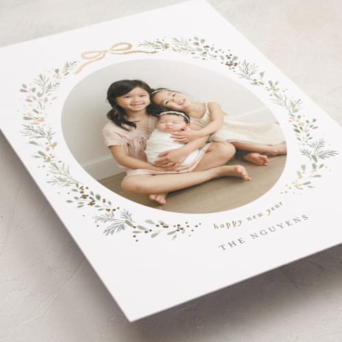 This is a sage foil pressed holiday cards with foil pressed by Itsy Belle Studio called ribbon & wreath printing on recycled smooth signature in standard