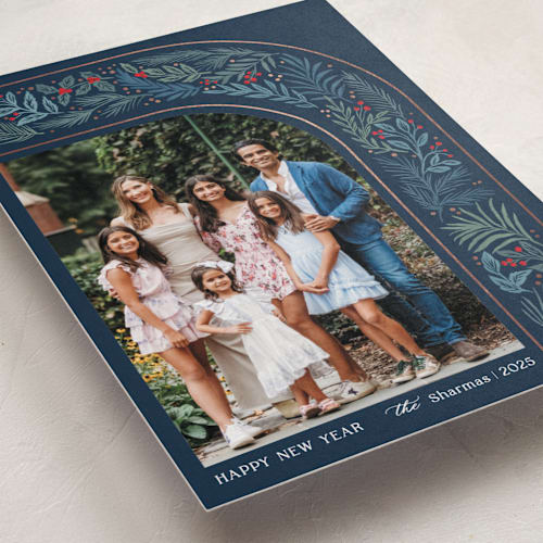 This is a sapphire foil pressed holiday cards with foil pressed by Elly called arch wreath printing on recycled smooth signature in standard