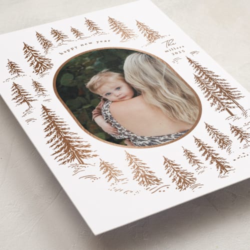 This is a winter foil pressed holiday cards with foil pressed by Yuliya Evseeva called winter forest printing on recycled smooth signature in standard