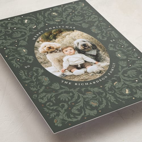 This is a spruce foil pressed holiday cards with foil pressed by Cedar and Grey called vintage floral holiday printing on recycled smooth signature in standard
