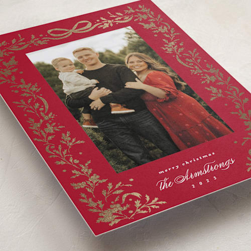 This is a candied apple foil pressed holiday cards with foil pressed by Kate Ahn called glittering garland printing on recycled smooth signature in standard