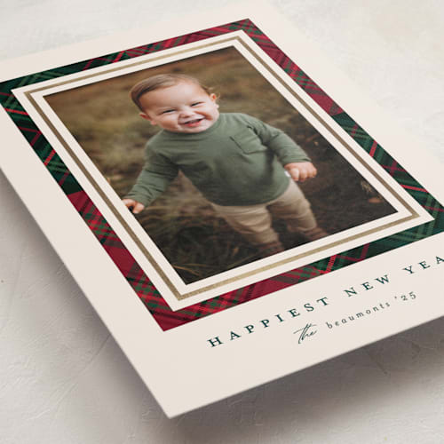 This is a ecru foil pressed holiday cards with foil pressed by Erica Krystek called christmas plaid printing on recycled smooth signature in standard