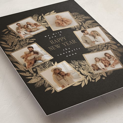 This is a coal foil pressed holiday cards with foil pressed by Leah Bisch called wreath printing on recycled smooth signature in standard