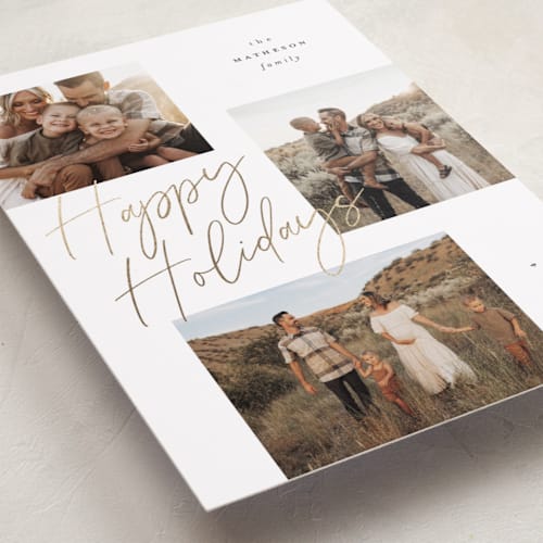 This is a cloud foil pressed holiday cards with foil pressed by Kelly Schmidt called scripted triple printing on recycled smooth signature in standard
