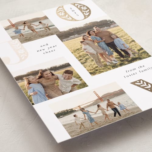 This is a snow foil pressed holiday cards with foil pressed by Laura Hankins called flora joy printing on recycled smooth signature in standard