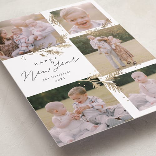 This is a snow foil pressed holiday cards with foil pressed by Rebecca Durflinger called sparkling pine printing on recycled smooth signature in standard