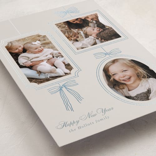 This is a champagne foil pressed holiday cards with foil pressed by Baumbirdy called bows printing on recycled smooth signature in standard