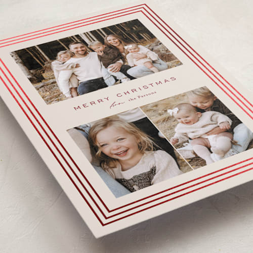 This is a cranberry foil pressed holiday cards with foil pressed by Kate Ahn called peppermint stripe printing on recycled smooth signature in standard