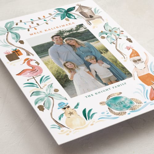 This is a peach punch foil pressed holiday cards with foil pressed by Sarah Knight called merry luau printing on recycled smooth signature in standard