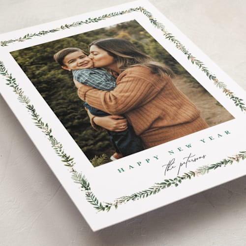 This is a spruce foil pressed holiday cards with foil pressed by Susan Moyal called holly & jolly printing on recycled smooth signature in standard