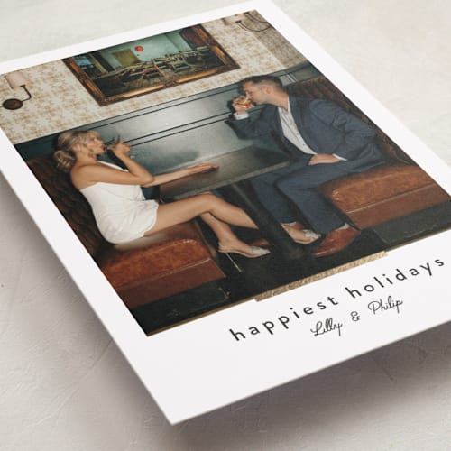 This is a cinder foil pressed holiday cards with foil pressed by Melanie Kosuge called moderne printing on recycled smooth signature in standard