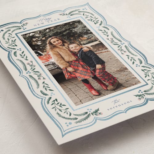 This is a sapphire foil pressed holiday cards with foil pressed by Chris Griffith called scalloped edge holiday printing on recycled smooth signature in standard