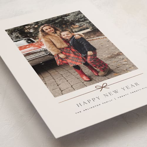 This is a linen foil pressed holiday cards with foil pressed by Kelly Schmidt called minimal line printing on recycled smooth signature in standard