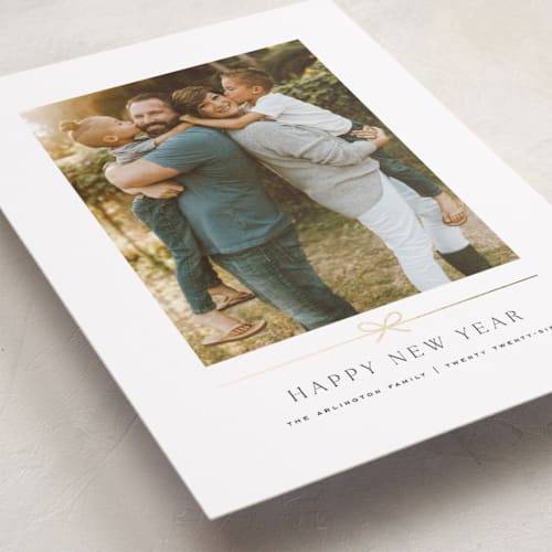 This is a snow foil pressed holiday cards with foil pressed by Kelly Schmidt called minimal line printing on recycled smooth signature in standard