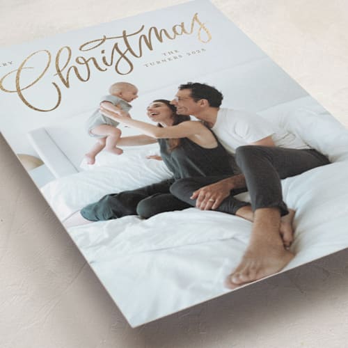 This is a champagne foil pressed holiday cards with foil pressed by Erin German called picture perfect printing on recycled smooth signature in standard
