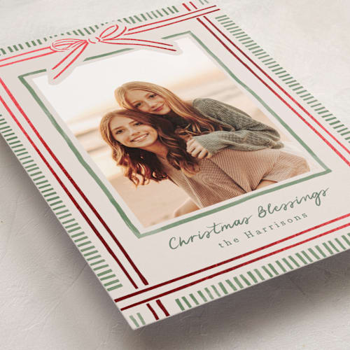 This is a moss foil pressed holiday cards with foil pressed by Chris Griffith called holiday wrap printing on recycled smooth signature in standard