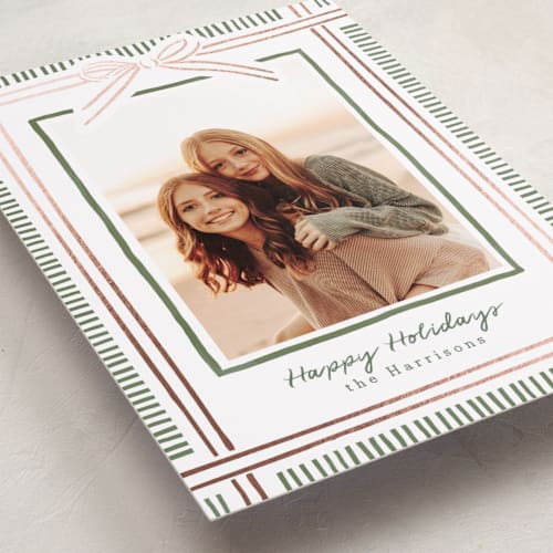 This is a pink sand foil pressed holiday cards with foil pressed by Chris Griffith called holiday wrap printing on recycled smooth signature in standard