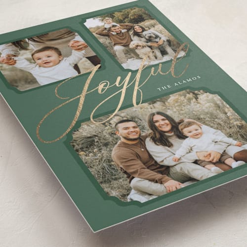This is a evergreen foil pressed holiday cards with foil pressed by Lindsay Megahed called joyful trio printing on recycled smooth signature in standard