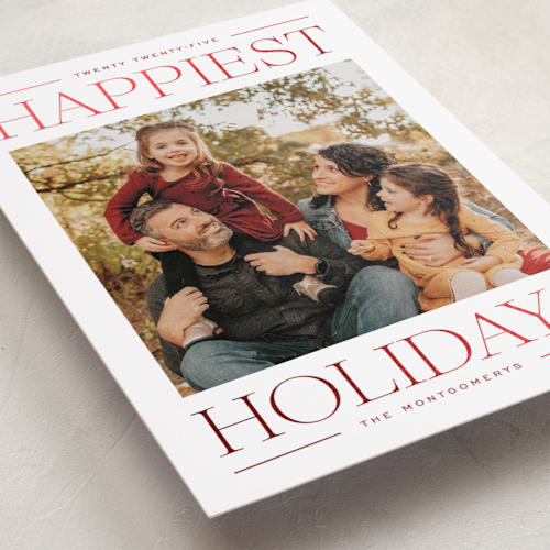 This is a cranberry foil pressed holiday cards with foil pressed by Ekko Studio called modern editorial printing on recycled smooth signature in standard