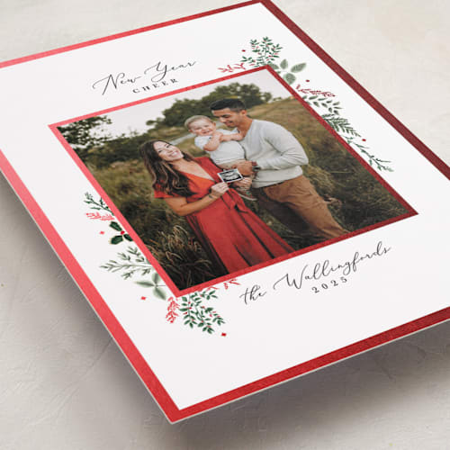 This is a crimson foil pressed holiday cards with foil pressed by Susan Moyal called wisp of greenery printing on recycled smooth signature in standard