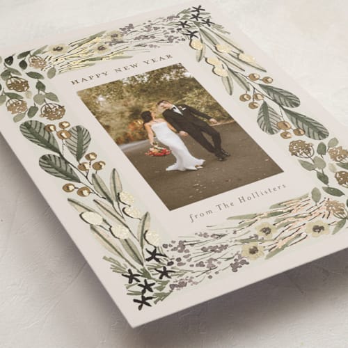 This is a sage foil pressed holiday cards with foil pressed by Meagan Christensen called abundance printing on recycled smooth signature in standard