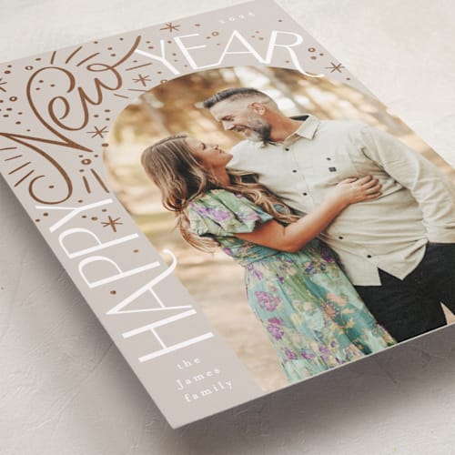 This is a ash foil pressed holiday cards with foil pressed by Alethea and Ruth called happy new arch printing on recycled smooth signature in standard