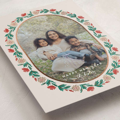 This is a eggnog foil pressed holiday cards with foil pressed by Amy Kross called laurel edge printing on recycled smooth signature in standard