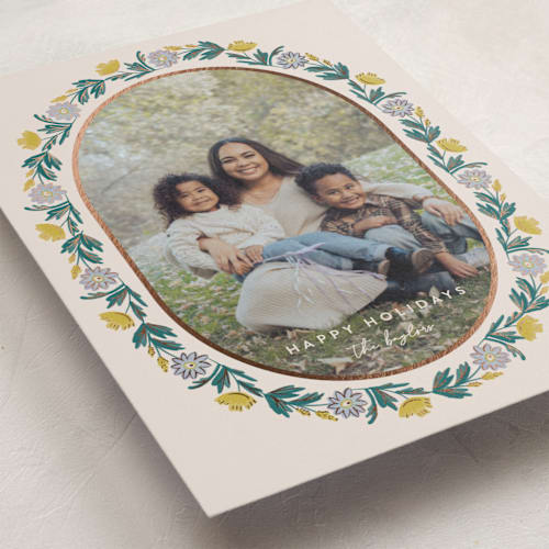 This is a buttercup foil pressed holiday cards with foil pressed by Amy Kross called laurel edge printing on recycled smooth signature in standard