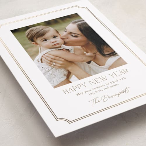 This is a snow foil pressed holiday cards with foil pressed by Yaling Hou Suzuki called holiday elegance printing on recycled smooth signature in standard