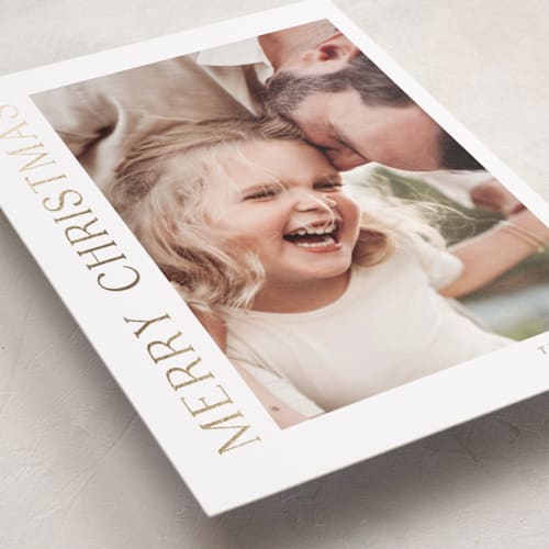 This is a cotton foil pressed holiday cards with foil pressed by Angela Thompson called gilded merry printing on recycled smooth signature in standard