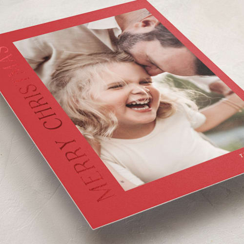 This is a poinsettia foil pressed holiday cards with foil pressed by Angela Thompson called gilded merry printing on recycled smooth signature in standard