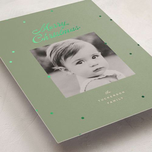 This is a sage foil pressed holiday cards with foil pressed by Ellen Schlegelmilch called dainty dots printing on recycled smooth signature in standard