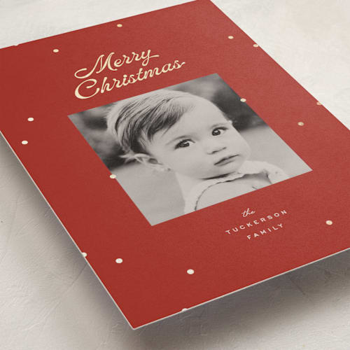 This is a poinsettia foil pressed holiday cards with foil pressed by Ellen Schlegelmilch called dainty dots printing on recycled smooth signature in standard