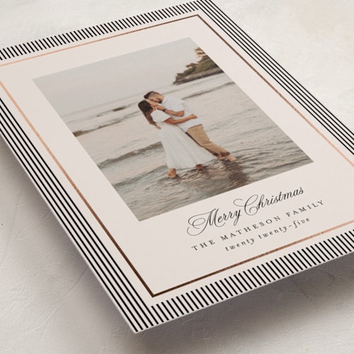 This is a linen foil pressed holiday cards with foil pressed by Kelly Schmidt called striped elegance printing on recycled smooth signature in standard
