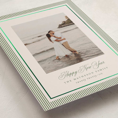 This is a cedar foil pressed holiday cards with foil pressed by Kelly Schmidt called striped elegance printing on recycled smooth signature in standard