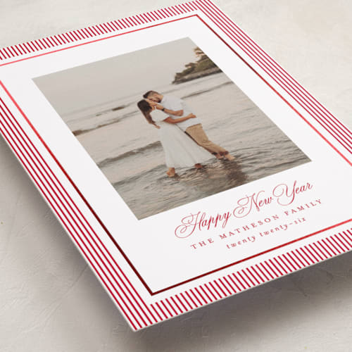 This is a berry foil pressed holiday cards with foil pressed by Kelly Schmidt called striped elegance printing on recycled smooth signature in standard